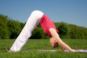 Woman in Dog Pose Outdoors